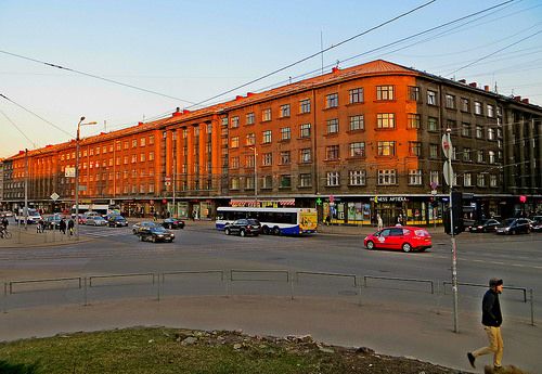 Apartment house with stores. Brivibas Street in Riga, Latvia. March 19, 2015
