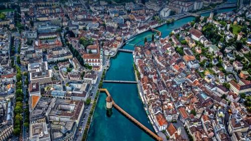 Aerial view of Chapel Bridge over the river Reuss in Lucerne, Switzerland (© Neleman Initiative/Gallery Stock) Bing Everyday Wallpaper 2021-06-18
/tmp/UploadBetaVkEWb9 [Bing Everyday Wall Paper 2021-06-18] url = http://www.bing.com/th?id=OHR.ReussRiver_ZH-CN5897721217_1920x1080.jpg

File Size (KB): 328.37 KB
Last Modified: November 26 2021 18:34:32
